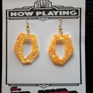 Sunshine yellow sparkle earring.